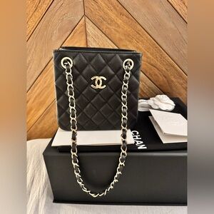 CHANEL Caviar Quilted Classic Mini Bucket Bag in Black